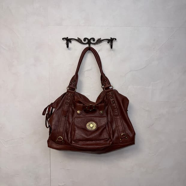 Brown multi pocket buckle tote bag