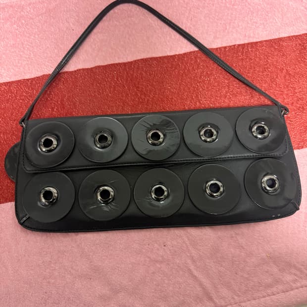 eyelet flat leather shoulder bag