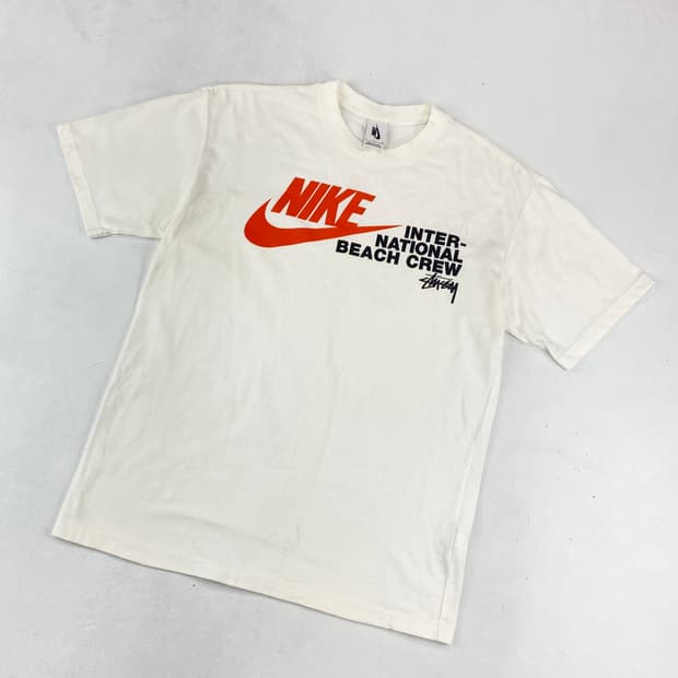 스투시 x 나이키 인터네셔널 비치 크루 하프 티 (95)