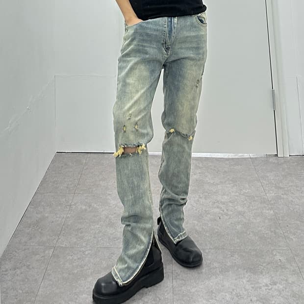 Vintage yellow washing destroyed jeans
