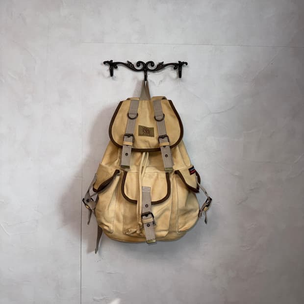 Yellowstone cream multi pocket backpack