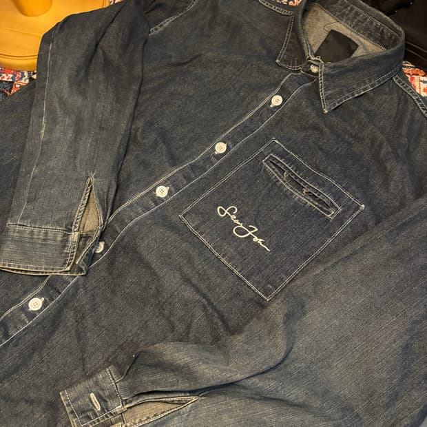 Y2K hip-hop Sean John’s denim shirt