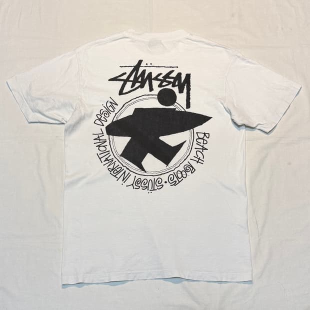 스투시 비치 루트 서프맨 티셔츠 내츄럴 화이트