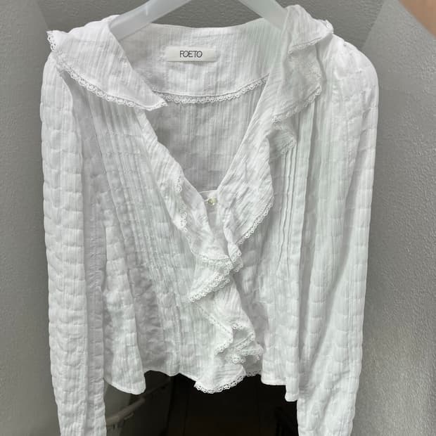 포에토 pure ruffle blouse - ivory