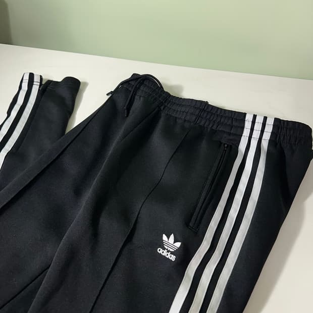 우먼S 아디다스 오리지날 불꽃로고 져지재질 SST 트랙팬츠