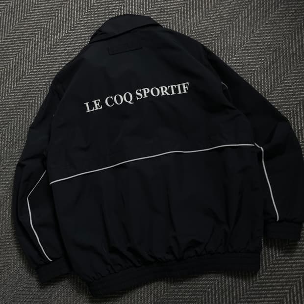 르꼬끄 빅로고 박시핏 우븐 바람막이 자켓 y 4559