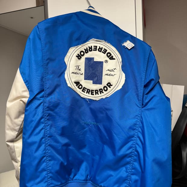 아더에러 컨버스 바시티 자켓 L 판매합니다