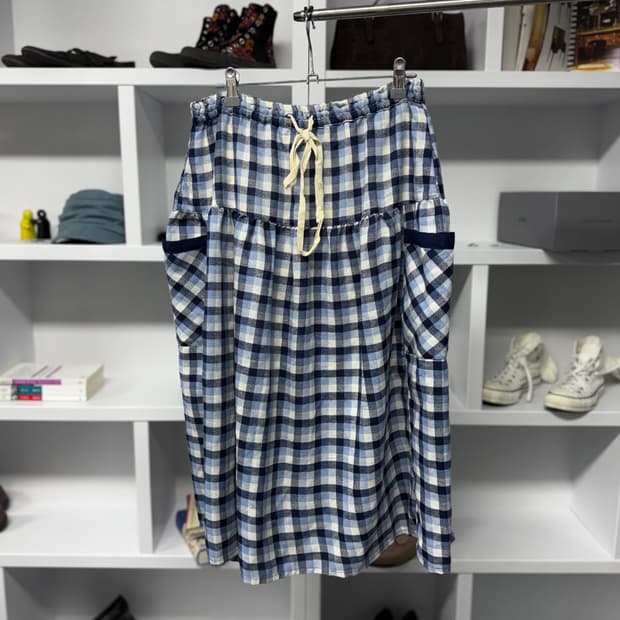 self service 체크 스커트