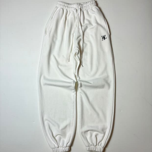 우알롱 볼륨 로고 와이드 조거 스웻 팬츠 PN8726