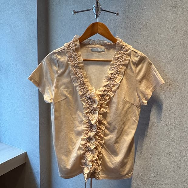 Cream Ruffle Muse Tee