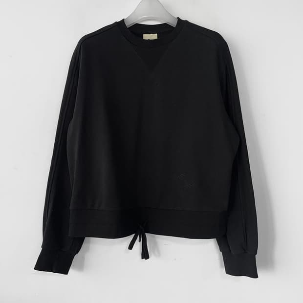 럭키슈에뜨 드로스트링 맨투맨