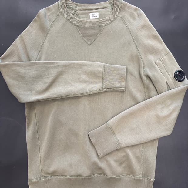  C.P. 컴퍼니의 렌즈 코튼 포켓 니트 정품