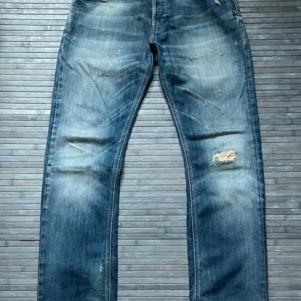 Distressed blue denim