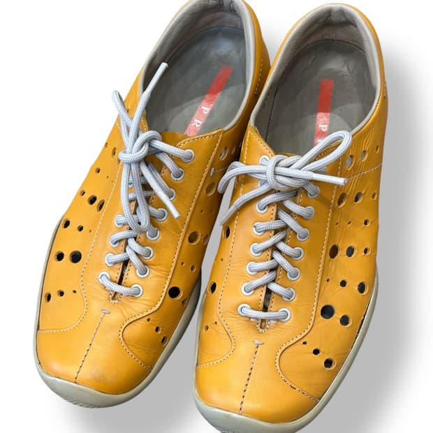 PRADA SPORT 펀칭 레더 빈티지 스니커즈