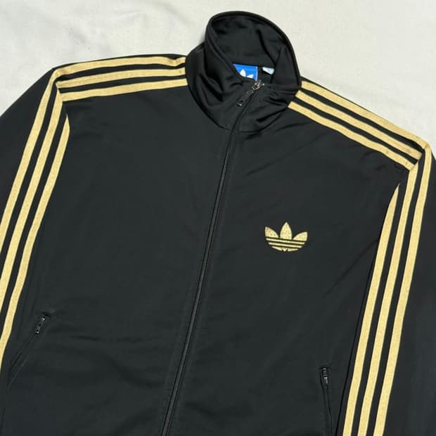 110 아디다스 파이어버드 골드라인 블랙 트랙탑