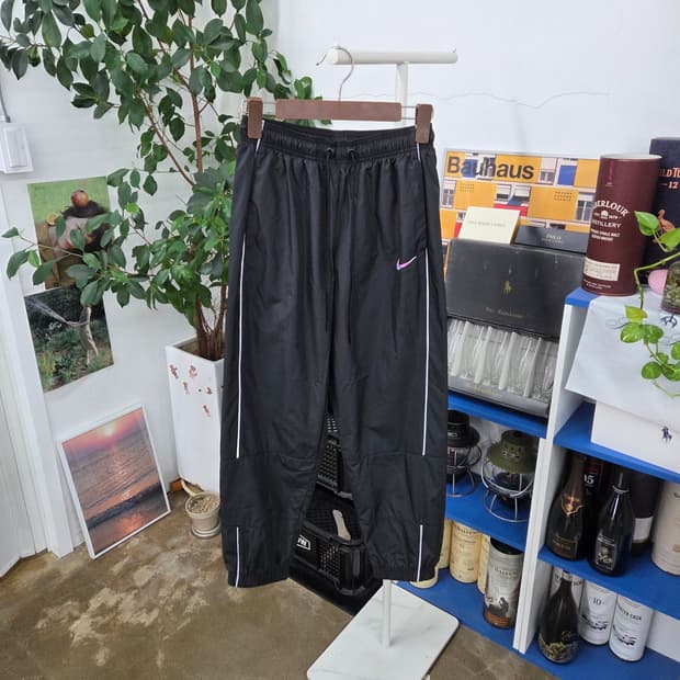 나이키 스포츠웨어 리펠 미드라이즈 조거팬츠 XS