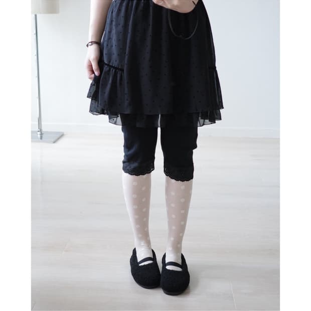 Black eyelet elasticated midi trousers