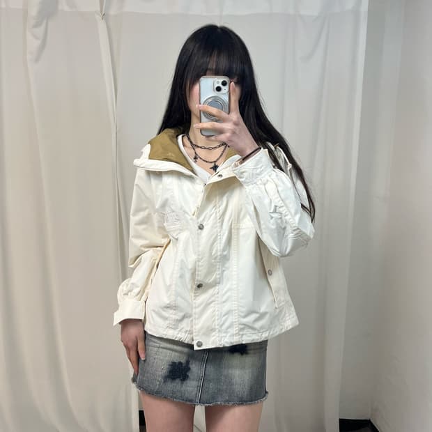 The North Face cream windbreaker