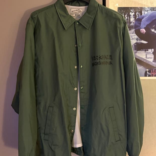 와코마리아 넥페이스 코치자켓