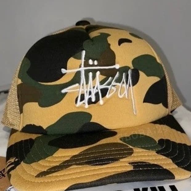 베이프x스투시 트러커 캡 옐로우