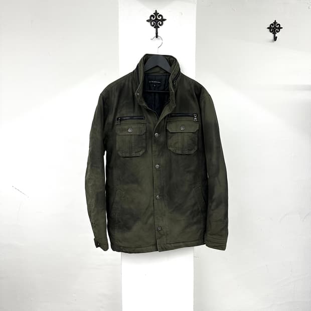 In the attic dirty washing  dark green j