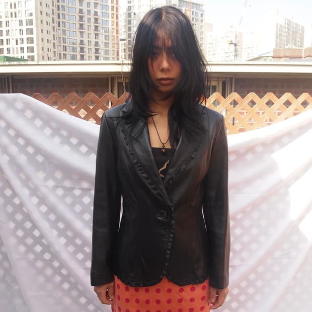 TAE KYOUNG 프릴 레더 자켓