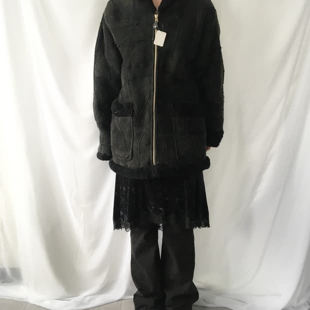 Patch work leather mustang