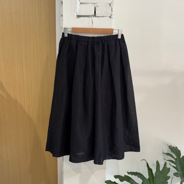 Niko and black skirt