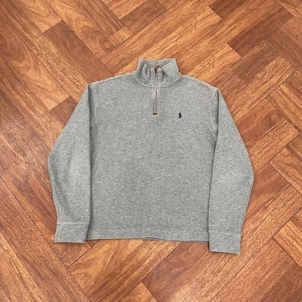 폴로 반집업 니트