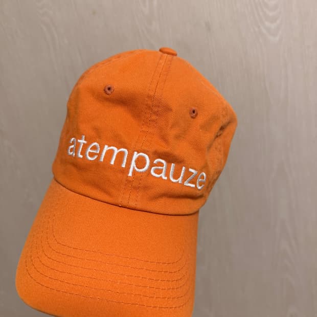 아템파우제 볼캡 오렌지