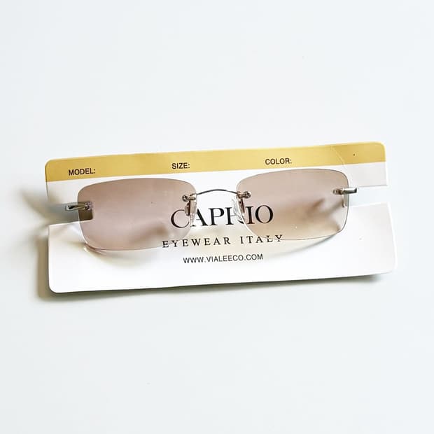 CAPRIO 무테 스퀘어 프레임 빈티지 틴트 선글라스