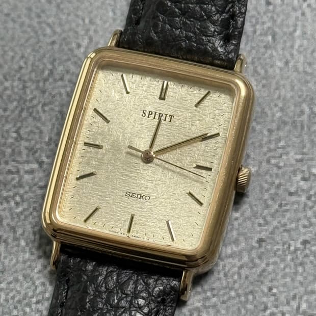 세이코 Seiko Sprit 쿼츠 골드 샴페인 리넨 다이얼