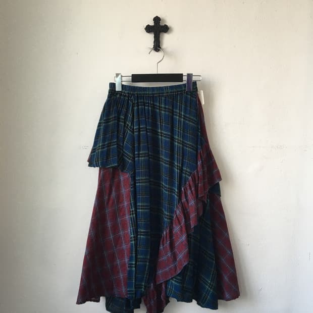 Unbalanced check pattern skirt
