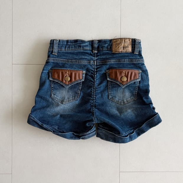 leather patch denim shorts