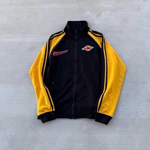 yellow and black mockneck zip up jacket