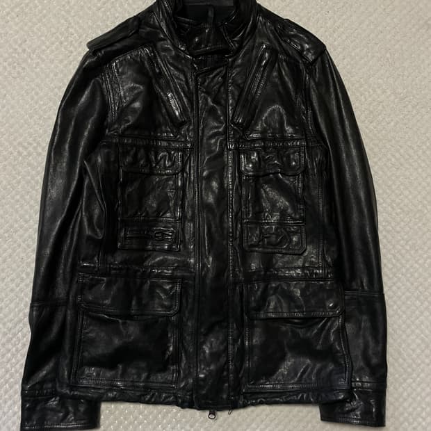 ELOQ 웨스턴 무드 램스킨 양가죽 절개 포켓 레더 자켓