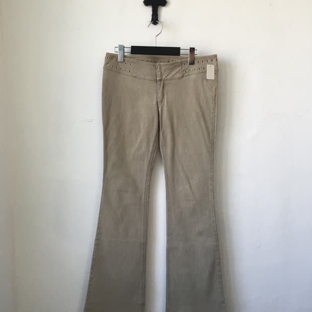 Eyelet point boots cut pants