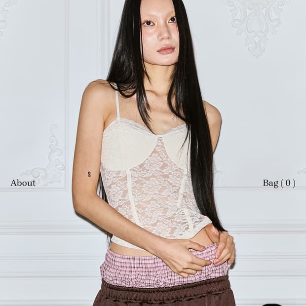 더미스테리어스호텔 스판 레이스 나시 슬리브리스 탑