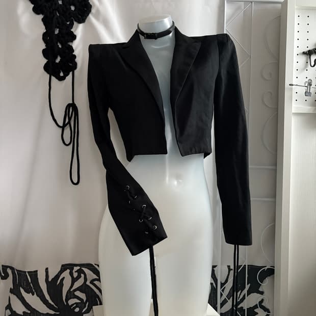 • Black eyelet cropped blazer