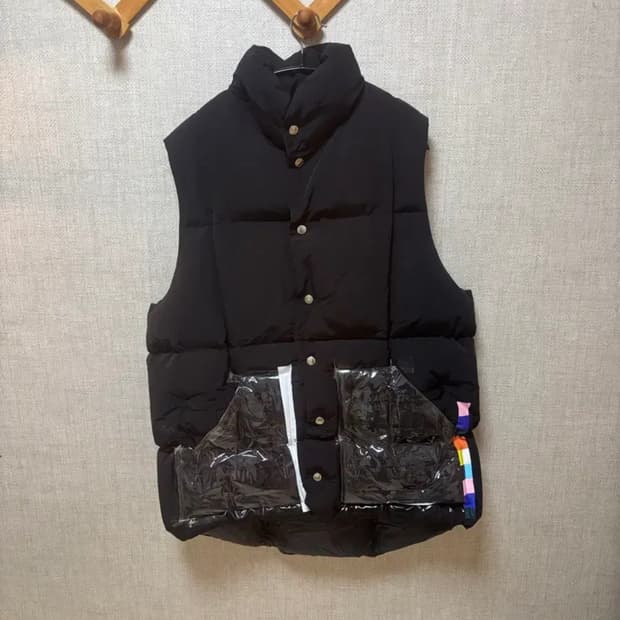 솔로이스트 패딩 베스트