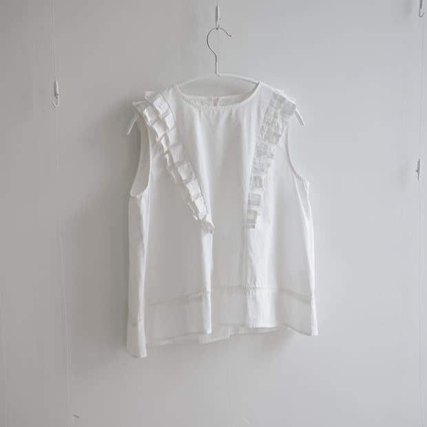 White pintuck ruffle sleeveless blouse