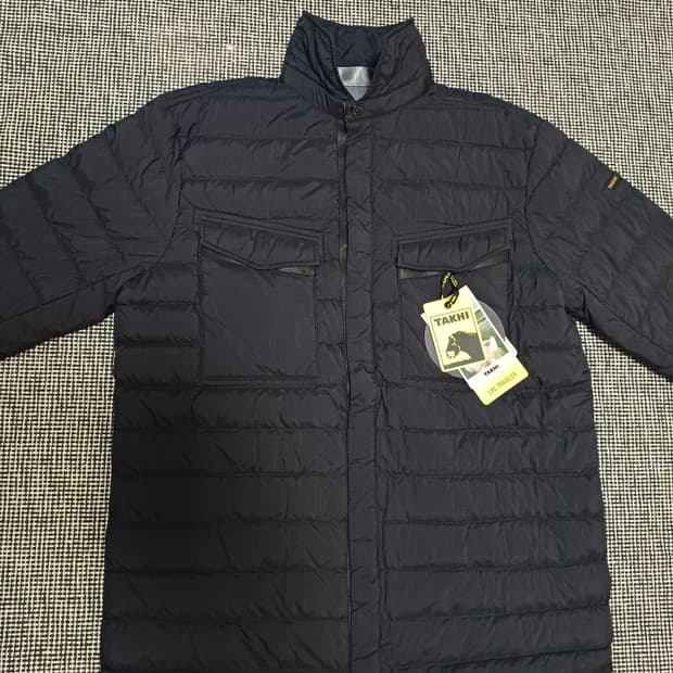 타키(TAKHI)**의 정품 오리털 경량 패딩 재킷 