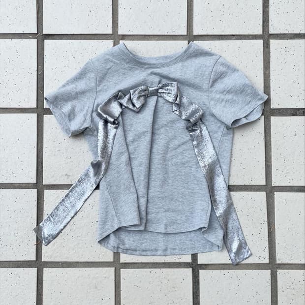 Metallic glitter bow curve top