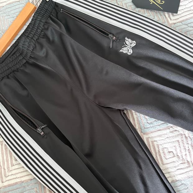 니들스 폴리스무스 트랙팬츠 