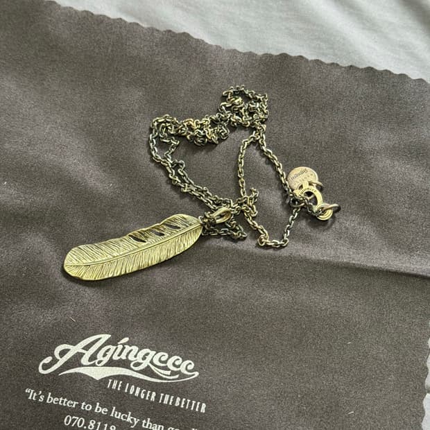 에이징씨씨씨 agingccc 깃털 목걸이