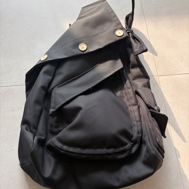 라프시몬스 이스트팩 단추 슬링백