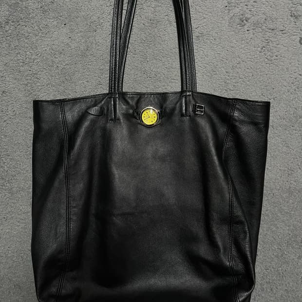 OS) years ago leather wacth bag
