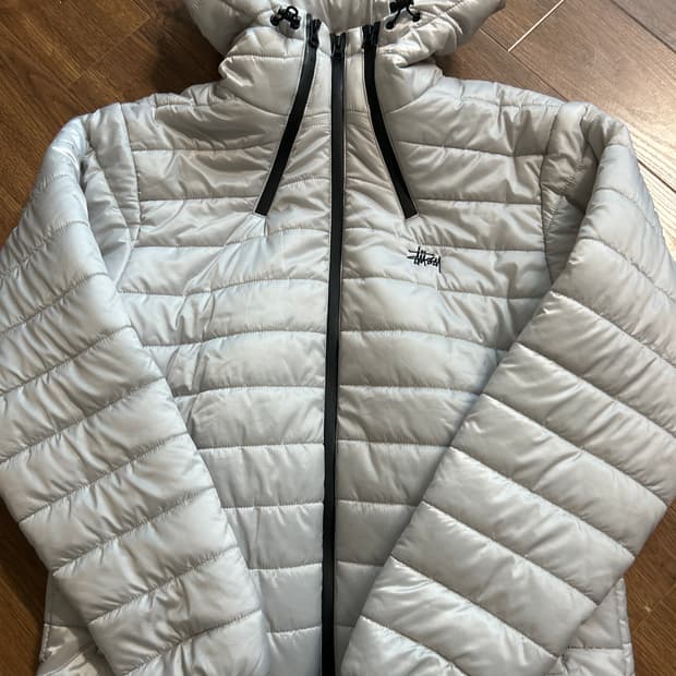 스투시 경량패딩