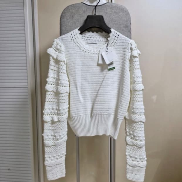 산드로 폼폼소매 뜨개니트