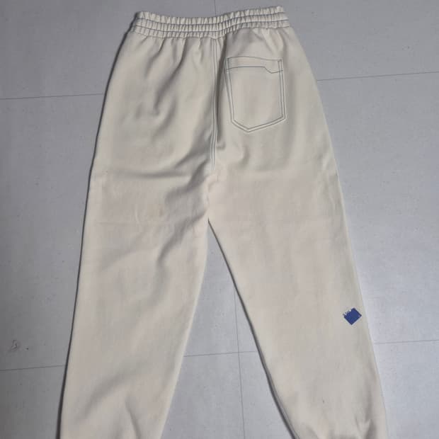아더에러 아이보리 조거팬츠